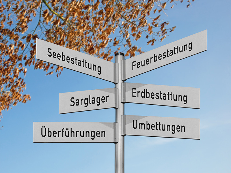 Schild mit Hinweis auf Bestattungsdienste weist den Weg zu einem Bestatter in Dortmund in ruhiger Umgebung