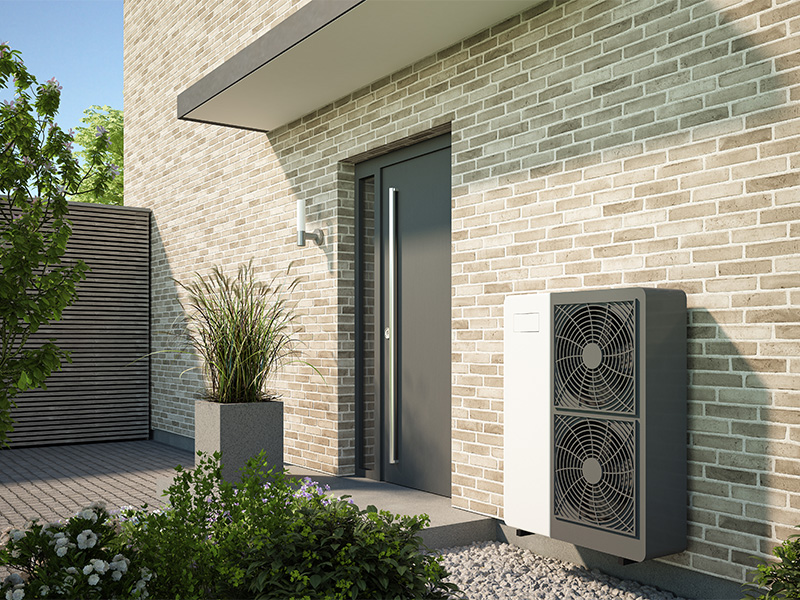 Luft-Wasser-Wärmepumpe an Hauswand installiert zur effizienten Wärmegewinnung aus Außenluft für Heizung und Warmwasser im Wohnhaus in Dortmund.